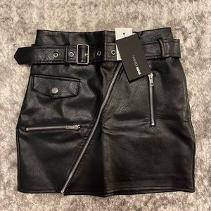 Leather mini skirt.